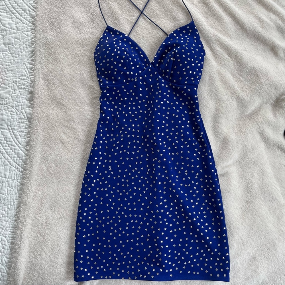 Blue sparkly mini dress with open back